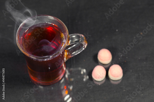 the Cup of tea on a dark background.