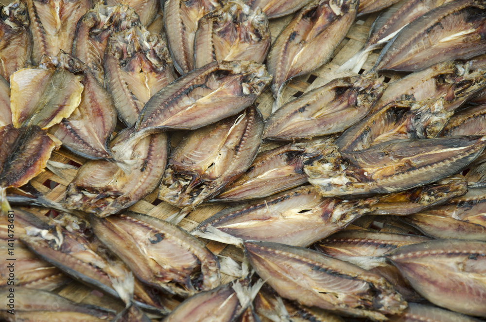 Dried raw fish preserves for sale at vendors seafood shop in Ang Sila jetty local market