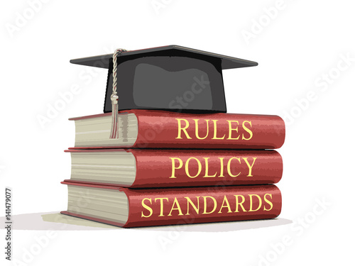 Stack of compliance and rules books. Image with clipping path 