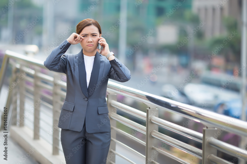 Woman calling the smartphone and she feel sad Woman calling the smartphone and she feel sad