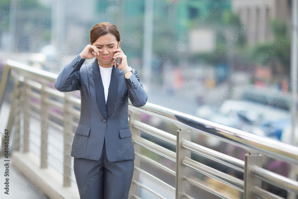 Woman calling the smartphone and she feel sad Woman calling the smartphone and she feel sad