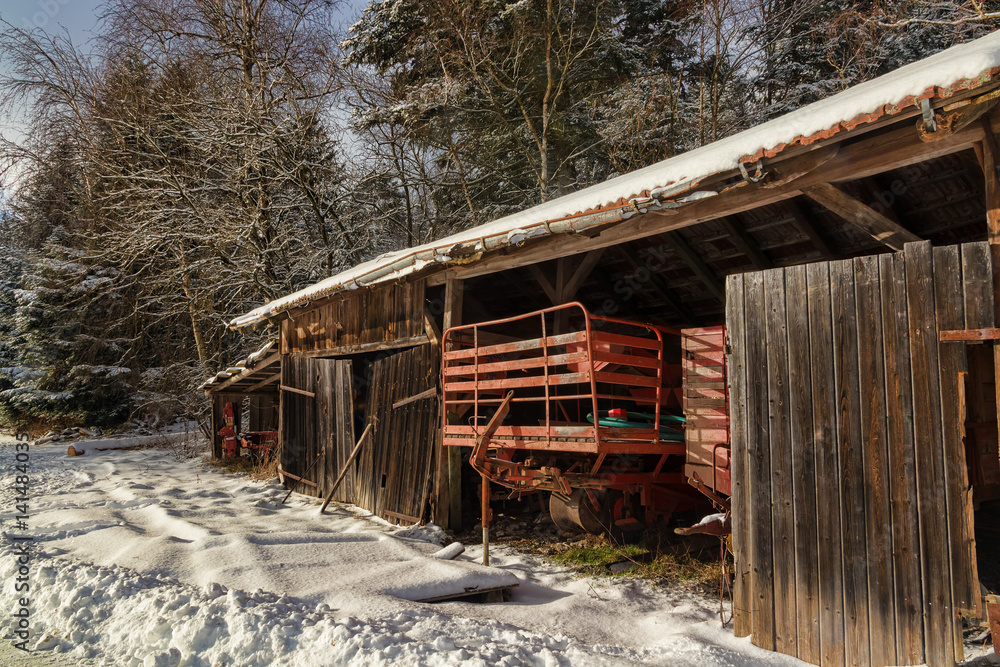 Shed with equipment in winter 