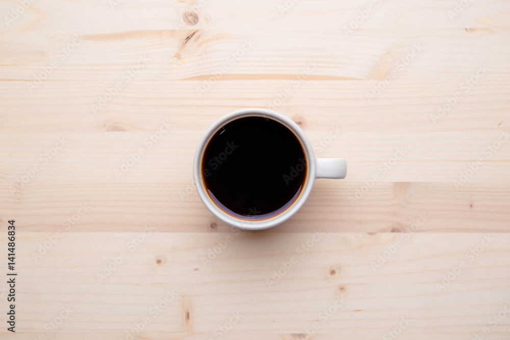 Coffee cup on wooden table Coffee cup on wooden table
