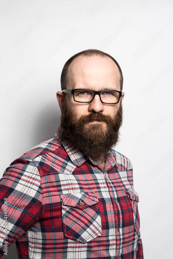 Bearded male in glasses Bearded male in glasses
