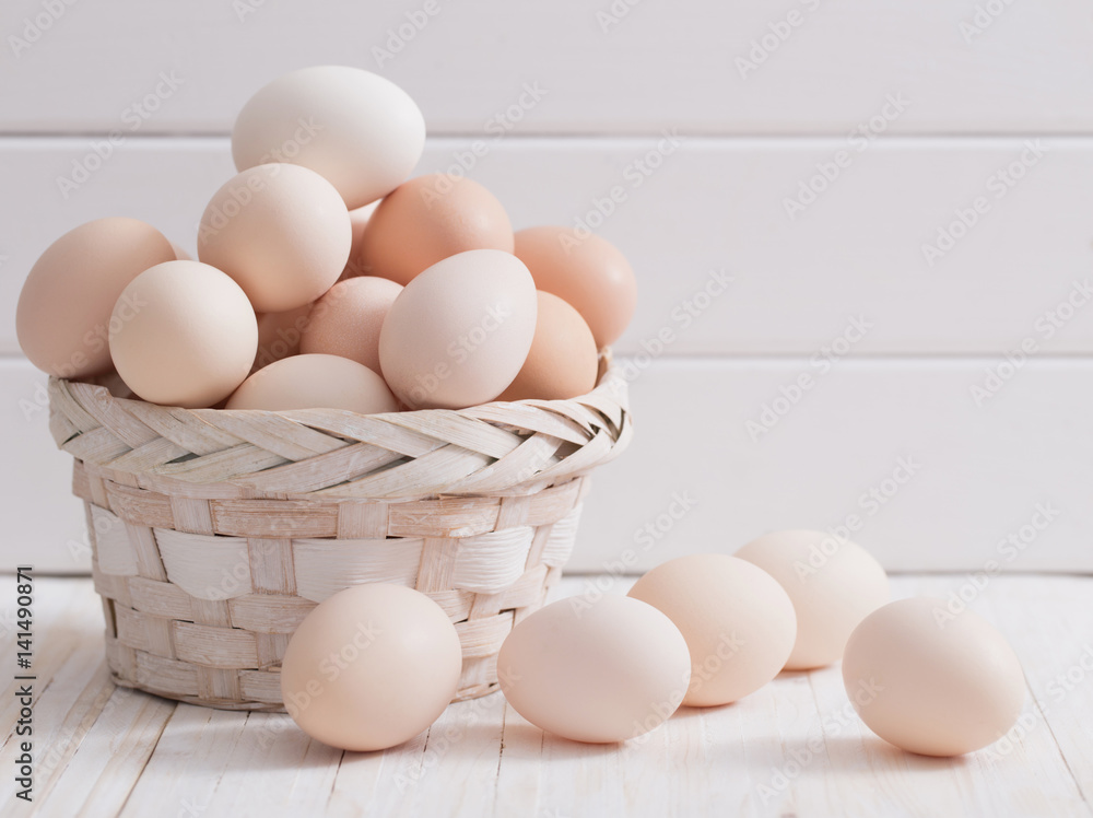 eggs on white wooden background eggs on white wooden background