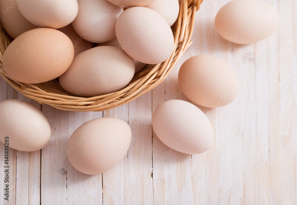 eggs on white wooden background