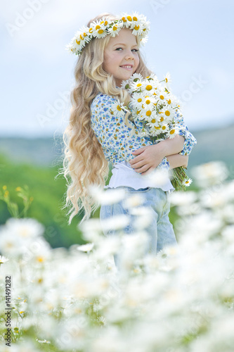 Beautiful little girl on nature with flowers  © nuzza11