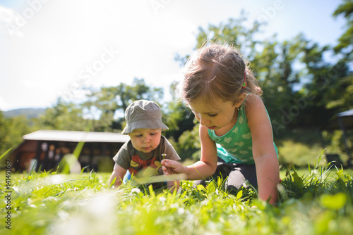 Boy and Girl in Grass