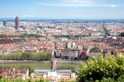 Summer view of Lyon with the Rhone river and the Tour Part-Dieu called Le Crayon