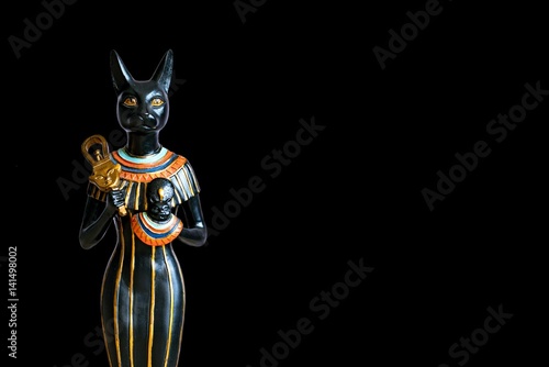 The Goddess Bastet - Role in ancient Egypt on black background.
Bastet was a goddess in ancient Egyptian religion.