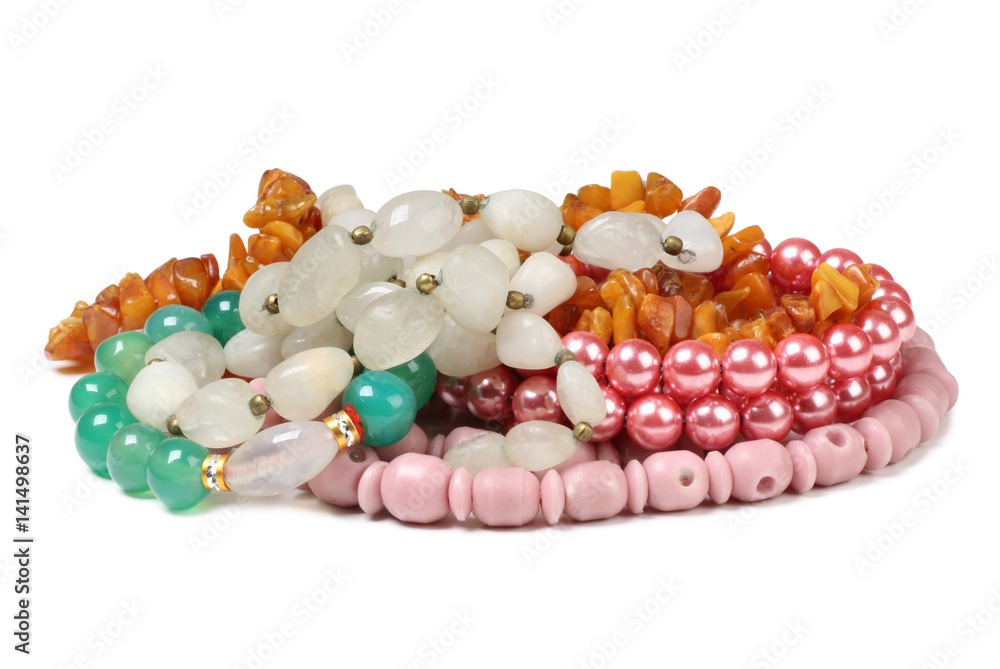 Jewelry made of precious stones on a white background Jewelry made of precious stones on a white background