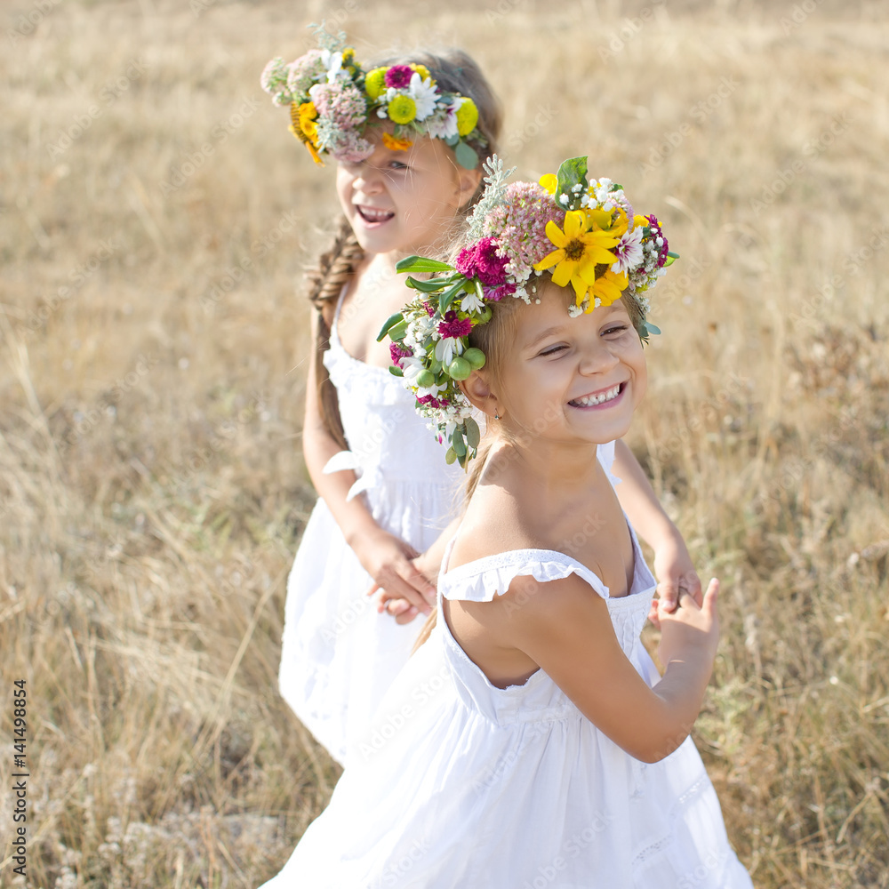 Beautiful little girls with wreaths Beautiful little girls with wreaths