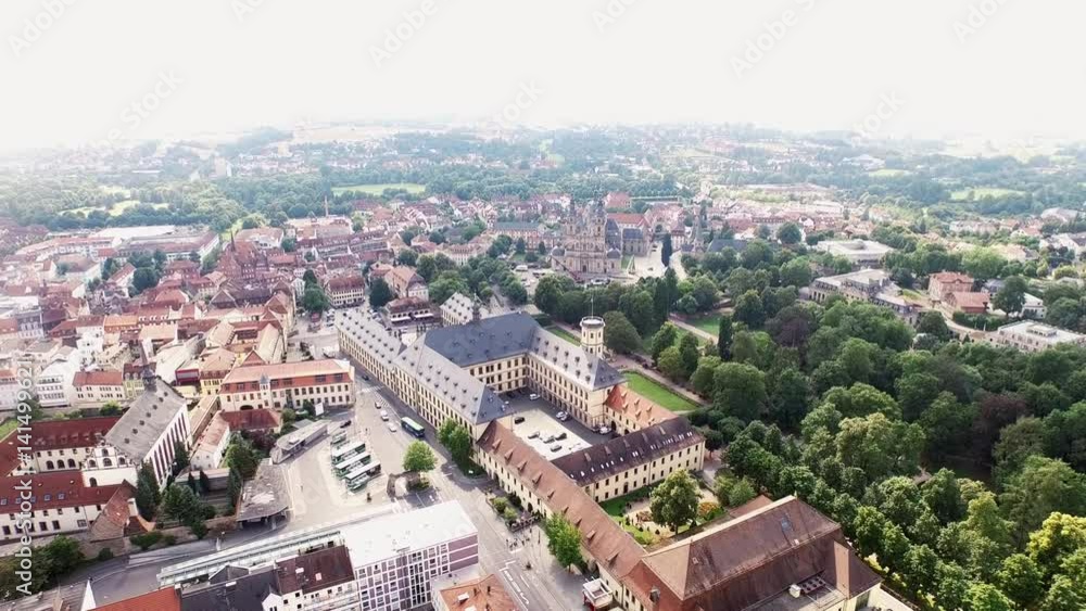 The city of Fulda in Germany. The camera rises into the sky above Fulda. It then flies slowly over the historical city of Fulda in Hessen. The city of Fulda in Germany. The camera rises into the sky above Fulda. It then flies slowly over the historical city of Fulda in Hessen.