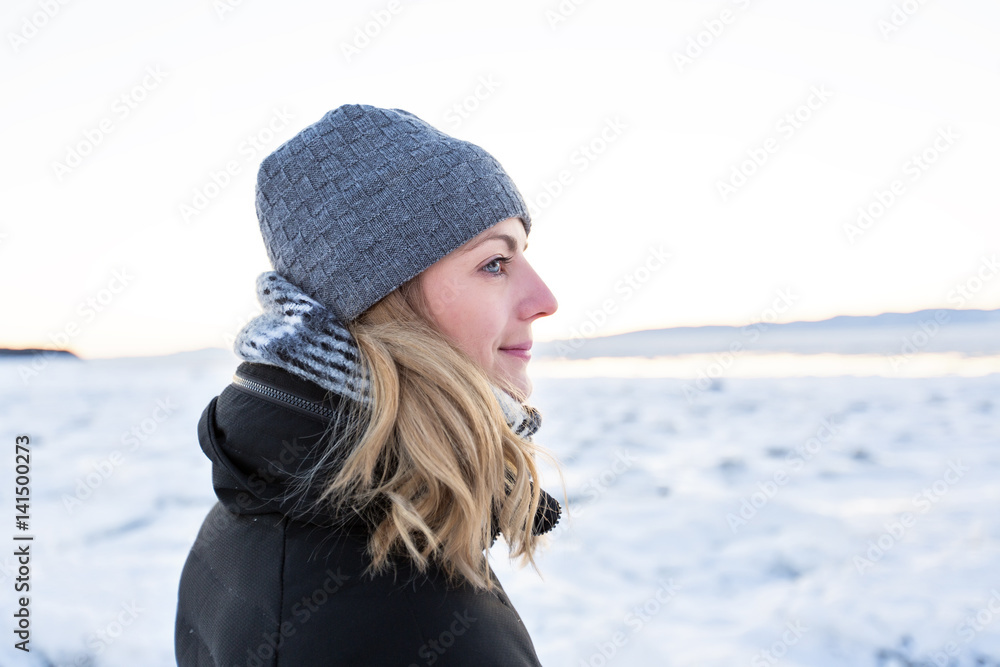 portrait of a young woman in winter season beach portrait of a young woman in winter season beach