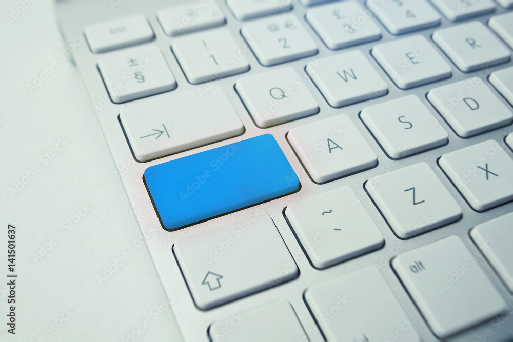 wide angel photo of keyboard with blue button wide angel photo of keyboard with blue button