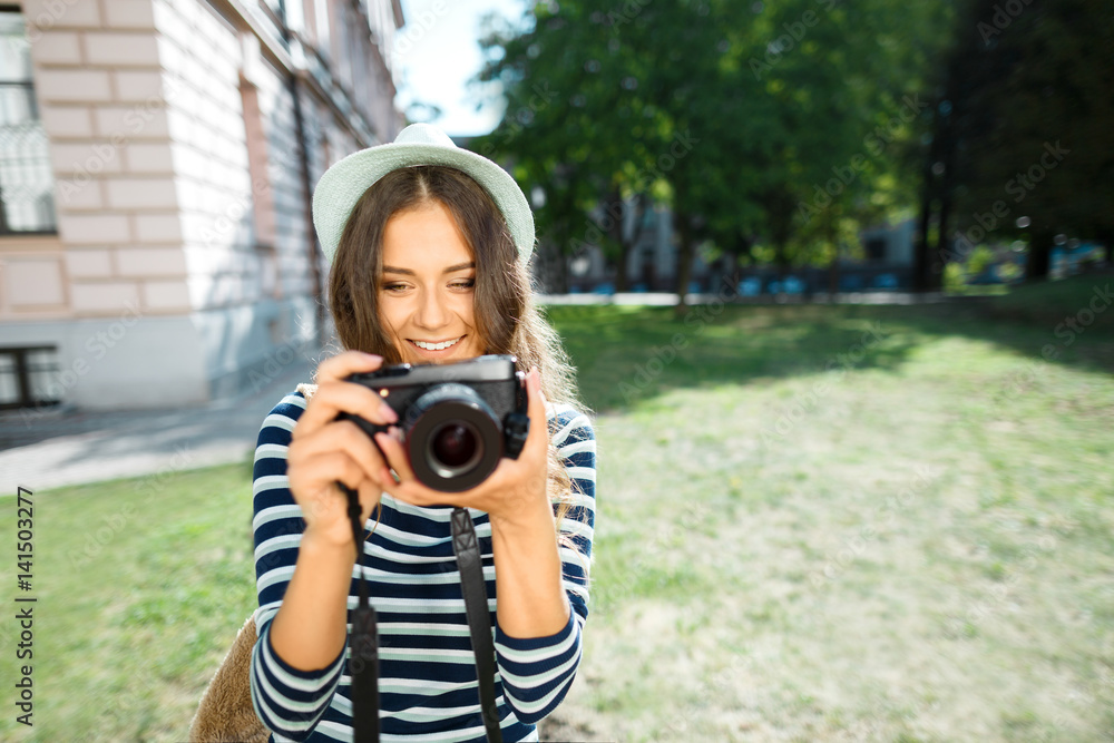 Cute tourist girl at European city background Cute tourist girl at European city background