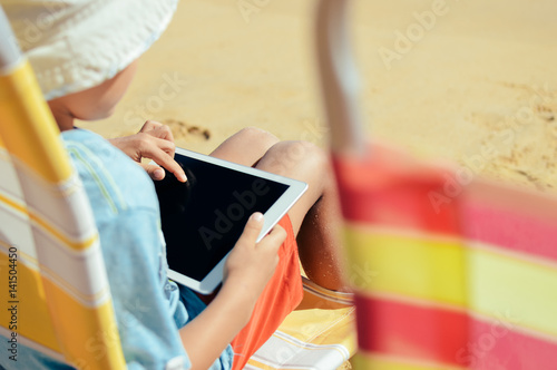 Children playing games on tablet computer