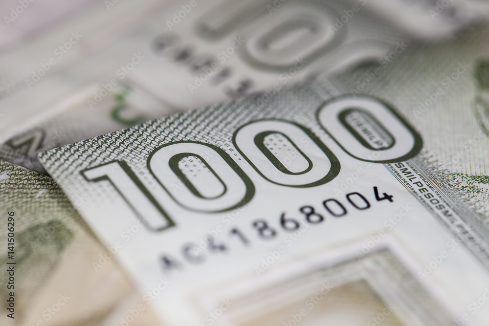 Money from chile stacked one on top of the other Money from chile stacked one on top of the other
