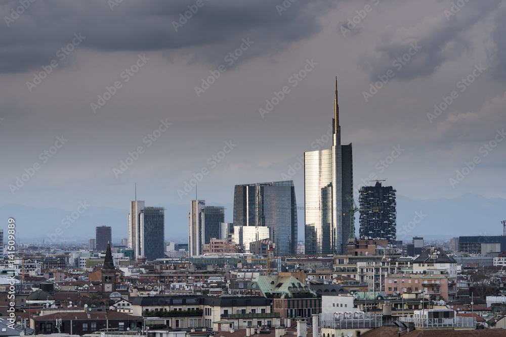 Milan Panorama skyline taken from the roof of the cathedral (Duomo di Milano), with modern skyscrapers in Porta Nuova business district. Milan Panorama skyline taken from the roof of the cathedral (Duomo di Milano), with modern skyscrapers in Porta Nuova business district.
