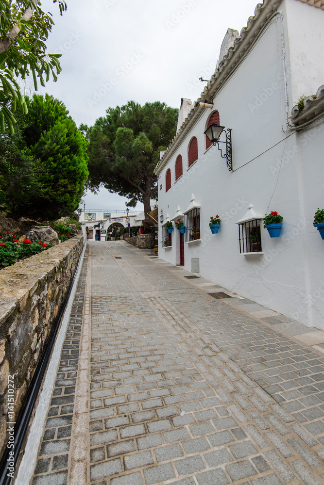Charming street of Mijas village in Spain
