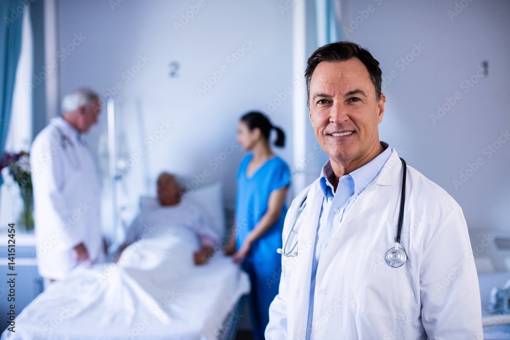 Portrait of male doctor smiling in the ward Portrait of male doctor smiling in the ward