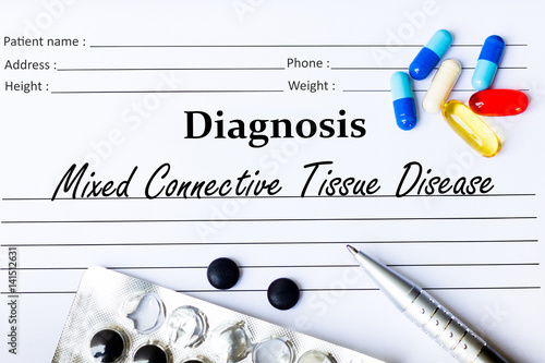Mixed Connective Tissue Disease - Diagnosis written on a piece of white paper with medication and Pills