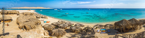 White sand, palm trees and blue sea © askaternoy