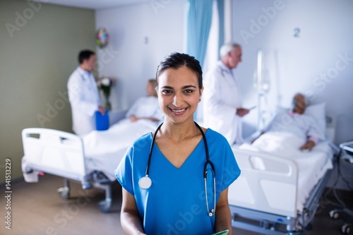 Portrait of female doctor smiling in the ward