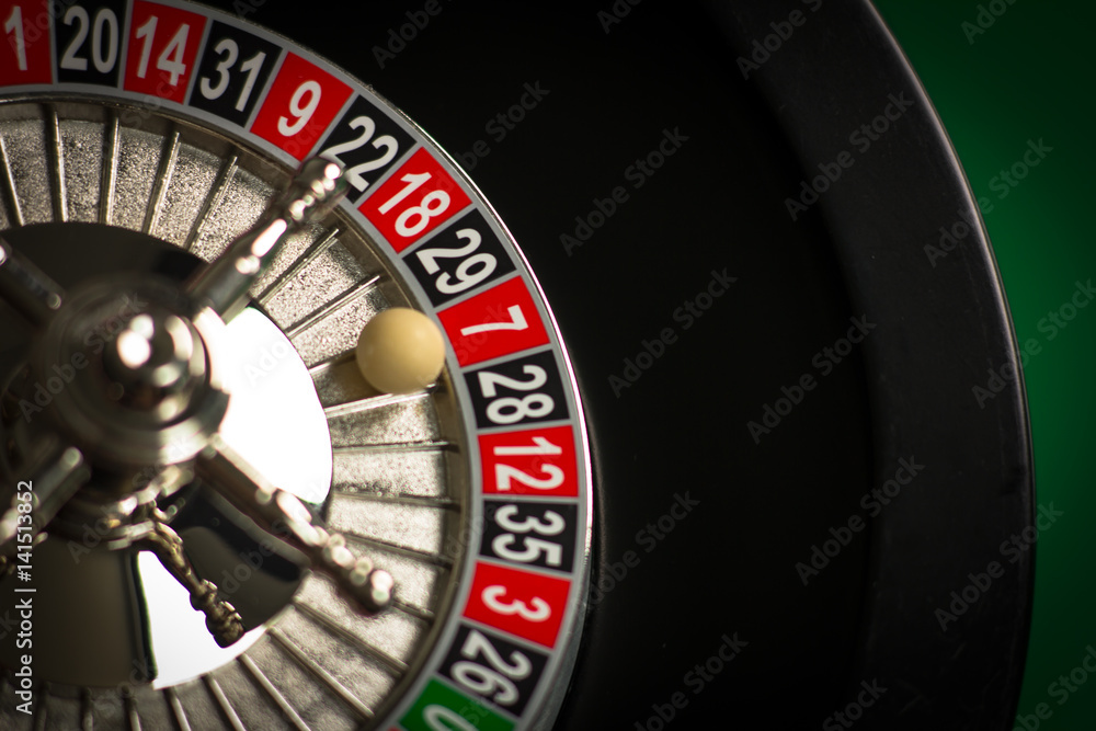 Casino theme. casino roulette, poker game, dice game, poker chips on a gaming table, Place for typography and logo. Casino theme. casino roulette, poker game, dice game, poker chips on a gaming table, Place for typography and logo.