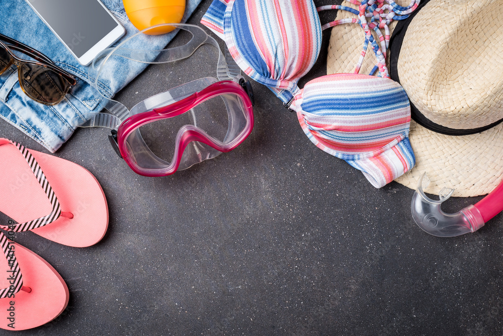 Naklejka premium Summer background with beach accessories. Top view