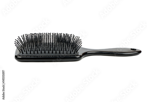 Black plastic comb isolated on white background