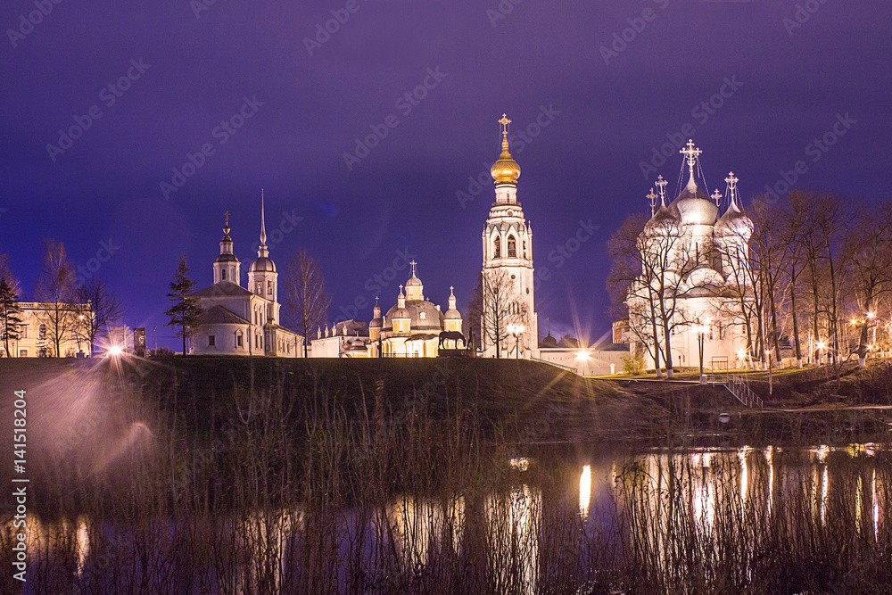 Kremlin square in night with Alexander Nevsky Church, Belfry Sophia Cathedral, Holy Resurrection Cathedral in Vologda, Russia