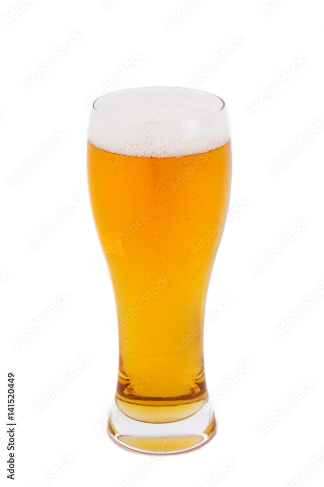 Lager beer in a glass isolated on white background Lager beer in a glass isolated on white background
