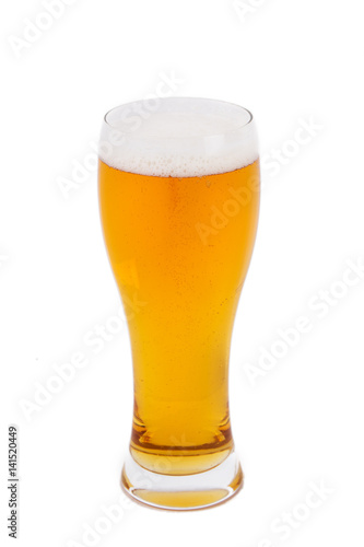 Lager beer in a glass isolated on white background