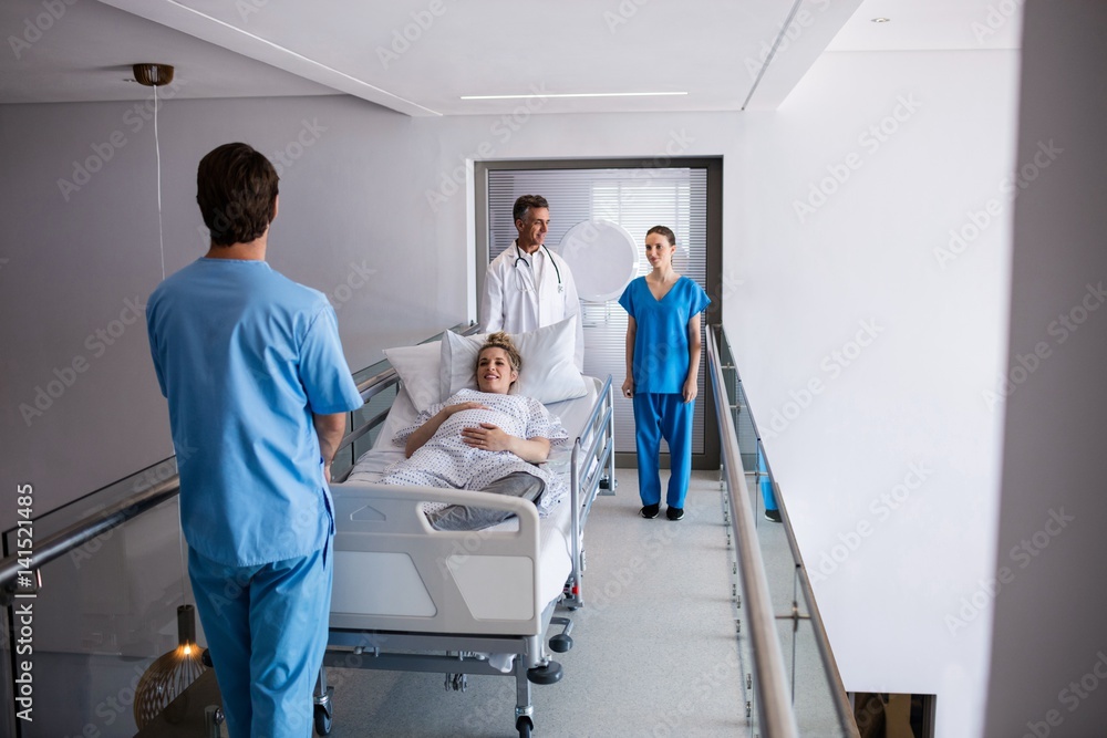 Team of doctors interacting with each other Team of doctors interacting with each other