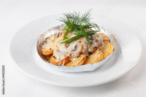 potatoes with mushrooms in foil isolated white background mayonnaise cheese