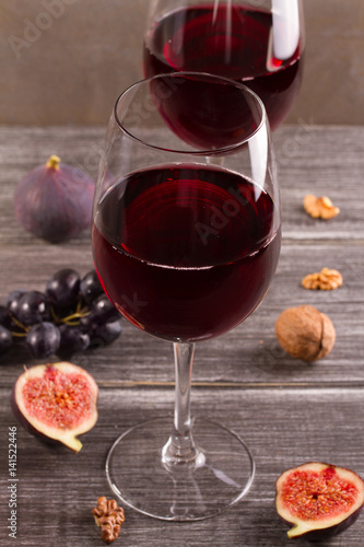 Glasses of red wine with grape. Wine and food still life