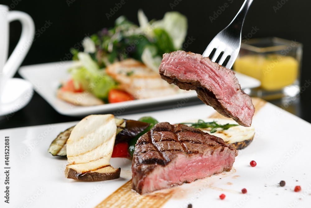 beef sirloin steak with fork