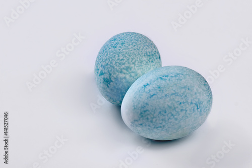 Blue dyed eggs. Colored chicken eggs isolated. Easter food ideas.