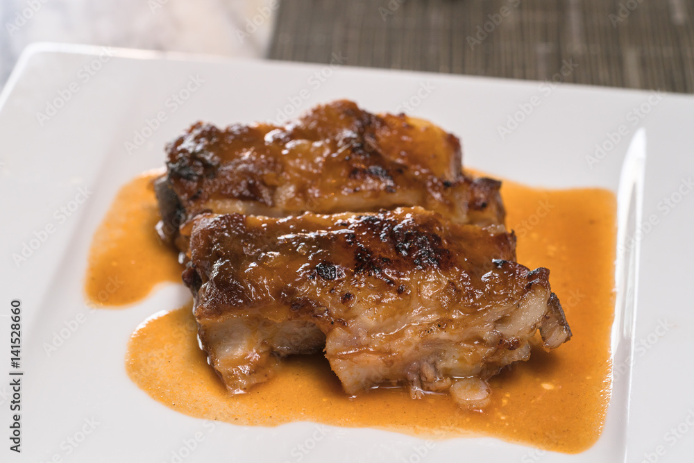 grill pork ribs on white plate grill pork ribs on white plate