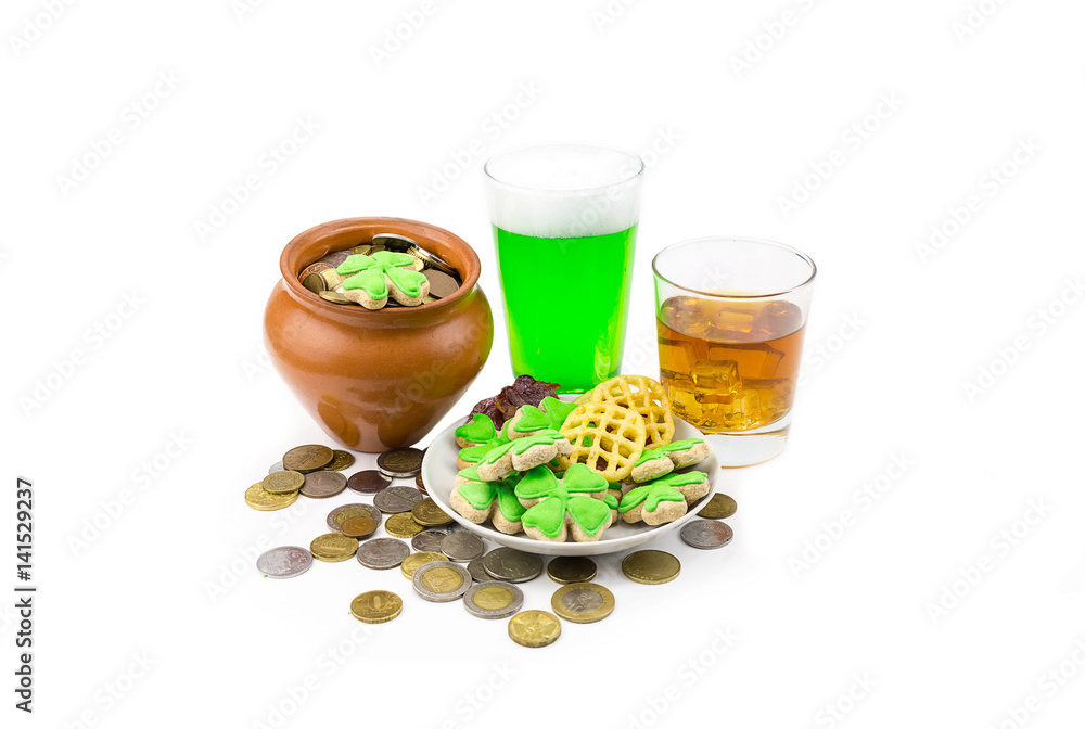 Clay pot with coins green beer whiskey Scotch and clover. The day of St. Patrick Clay pot with coins green beer whiskey Scotch and clover. The day of St. Patrick