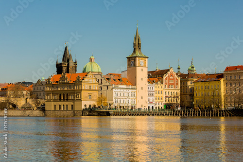 Prague Czech Republic old water tower with a clock historical part of the city on the bank of the river vltava