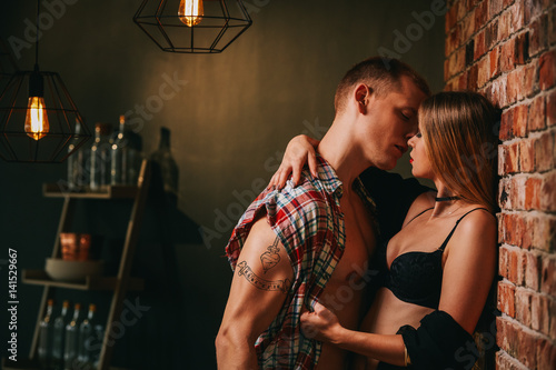 Woman and man kissing photo