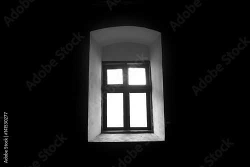Vintage window in a dark room.
