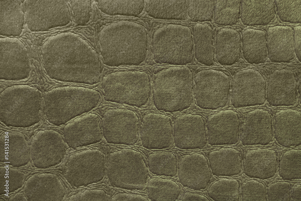 Green background from soft upholstery textile material, closeup. Fabric with pattern Green background from soft upholstery textile material, closeup. Fabric with pattern