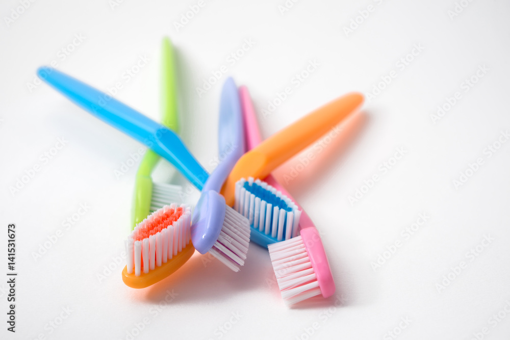 colorful toothbrushes on white background colorful toothbrushes on white background