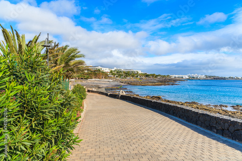 Coastal promenade in Playa Blanca holiday village  Lanzarote island  Spain