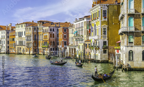 Gondoliers in grand canal