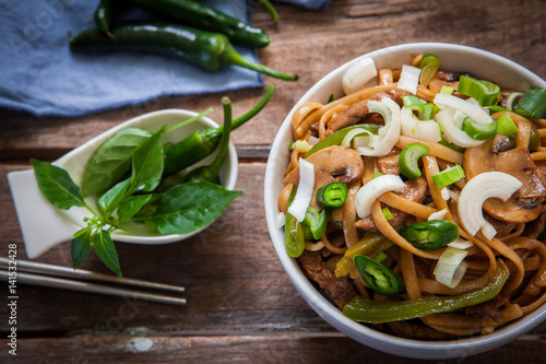 Thai beef noodles with green chili and onions