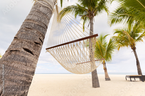 Mauritius, female leggs relaxing on hammock photo